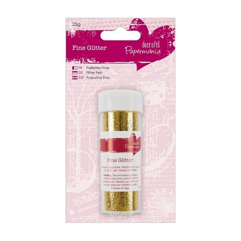 A 25g container of Printable Heaven Fine Glitter in gold (PMA 401403), with a sprinkle cap and clear packaging with a pink and white backing card—ideal for craft projects.
