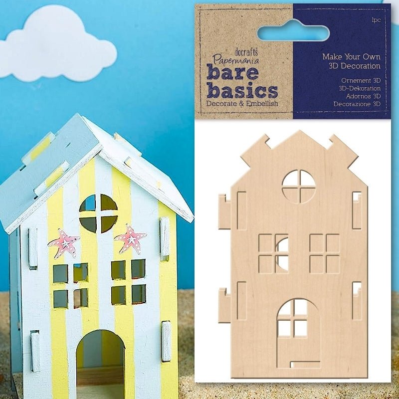 Printable Heaven's Make Your Own 3D Decoration - Wooden House (Bare Basics, PMA 174735) is a flat plywood sheet with cut-out pieces to assemble and decorate your own model—ideal for DIY projects.