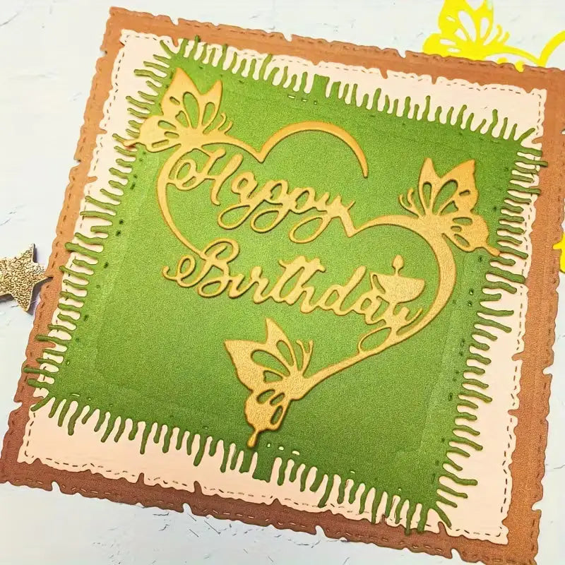 Handmade birthday card featuring layers of brown, pink, and green paper for inspiring your next craft project. The standout “Happy Birthday” sentiment is elegantly showcased inside a heart and surrounded by delicate butterfly designs, with decorative cutout edges expertly crafted using the Printable Heaven Happy Birthday Sentiment Cutting Die - Floral (1 PC) (DJ036). A wonderful choice for anyone who appreciates unique handmade cards.
