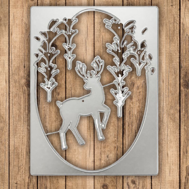 Create stunning Christmas cards with the Printable Heaven Winter Forest Scene Cutting Die (2 PCS) (T052), featuring a beautifully detailed metal art design of a majestic deer with antlers standing among woodland trees, all elegantly framed within an oval shape. The rustic wooden plank background evokes a charming winter forest atmosphere, making this cutting die set perfect for festive cardmaking and seasonal crafts.