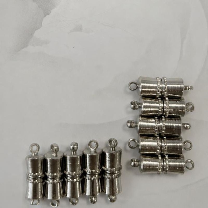 Ten Silver Cylindrical Magnetic Jewellery Clasps arranged in two rows.