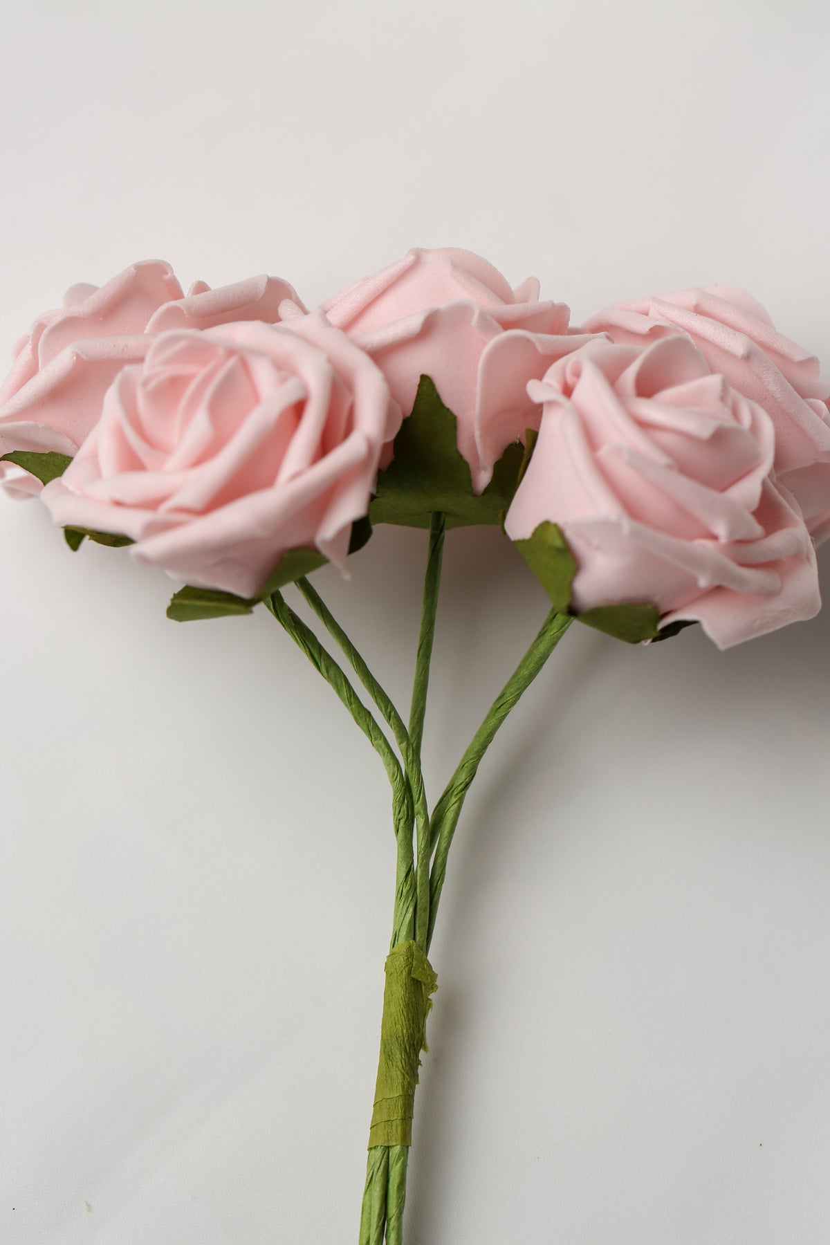 A small bunch of four Printable Heaven Large Foam Rose Bunch in Vintage Pink, each with green stems and 2″ wide.