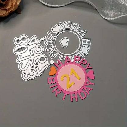 Metal cutting dies from the Printable Heaven Birthday Cutting Die Set with Numbers (4 PCS) (W092), shown alongside a finished paper craft reading “HAPPY BIRTHDAY 21” decorated with hearts, displayed on a gray surface with a ribbon and brown flower in the corner. Ideal for creating personalised birthday cards, this set highlights the creative potential of number dies and Printable Heaven’s exclusive birthday cutting die collection.