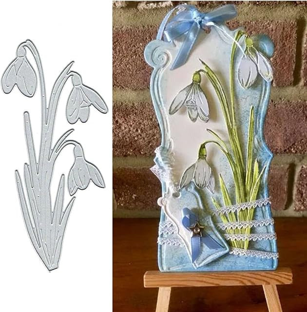 The Large Snowdrop Cutting Die (1 PC) (F147) by Printable Heaven (left) and a completed card showcasing delicate white snowdrops, a blue ribbon, lace accents, and a small heart embellishment on an easel with a brick background (right)—the perfect inspiration for your papercrafting projects using this versatile die to create stunning handmade cards.