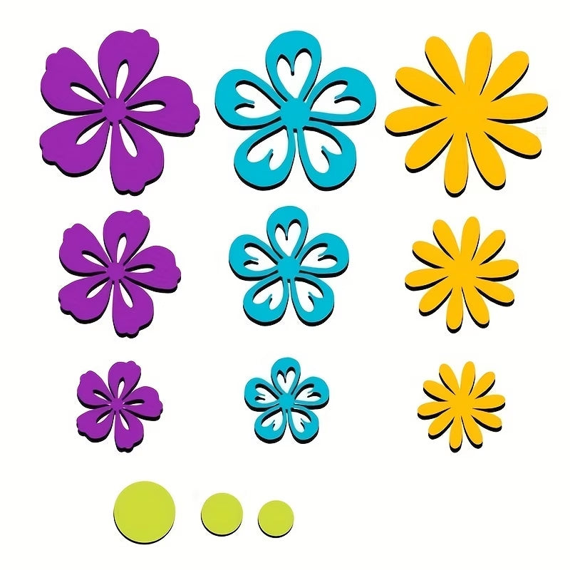 Twelve colorful and uniquely designed 3D flowers and circles from the Printable Heaven Flower Cutting Die Set (12 PCS) F045, in shades of purple, blue, yellow, and green, are artfully arranged on a white background. The varied petal shapes and sizes make this die set perfect for paper crafting or as creative inspiration.