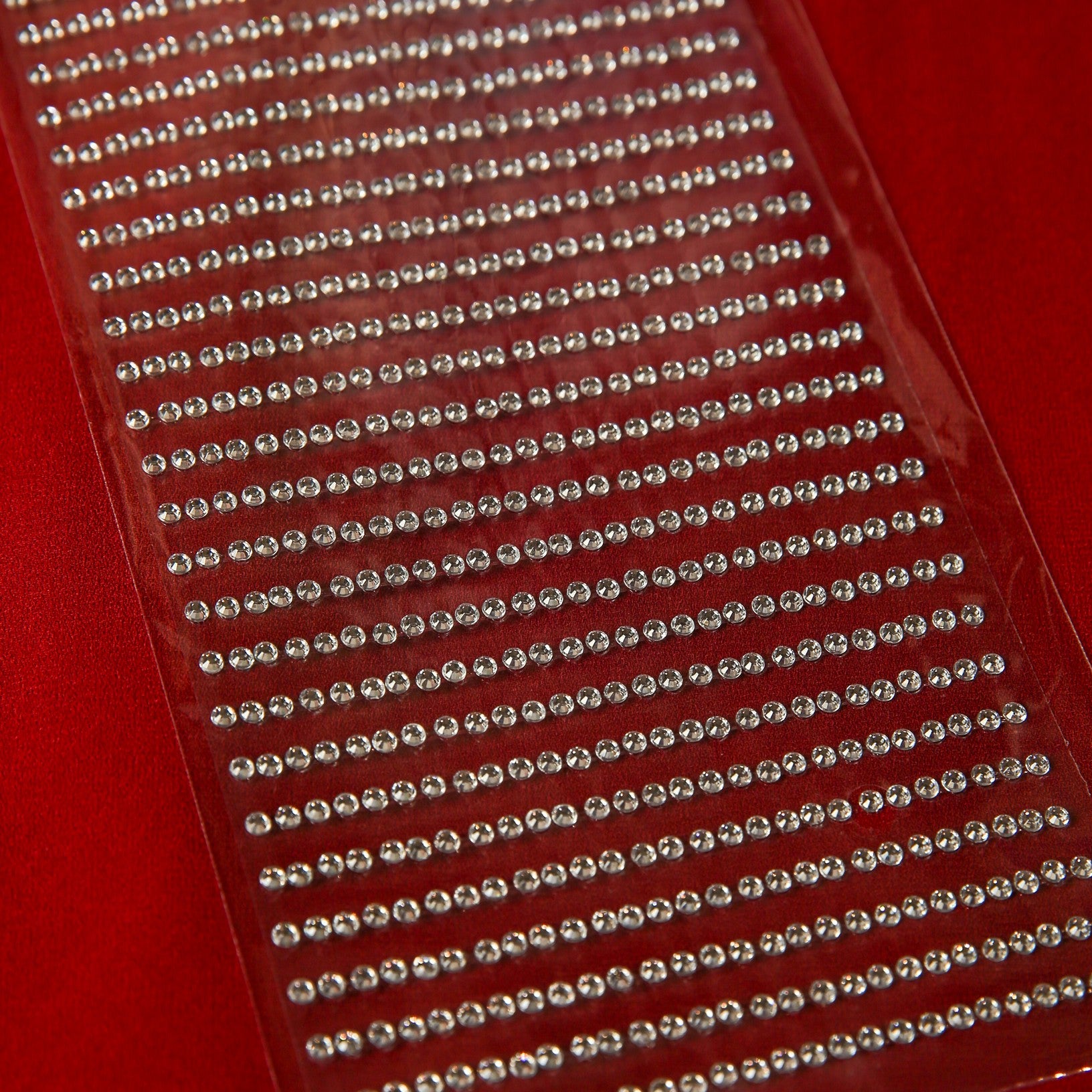 Printable Heaven’s 3mm Silver Crystal Adhesive Jewels are perfect for adding sparkle to your scrapbook pages or Christmas cards—these small, round stickers shine bright and come neatly arranged on a sheet.