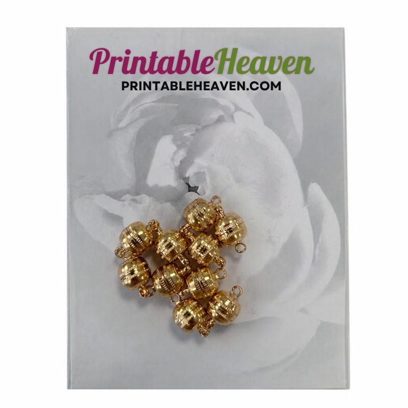 Ten spherical gold-toned Gold Magnetic Jewellery Clasps (10pcs) from Printable Heaven arranged in a pile on a branded display card.