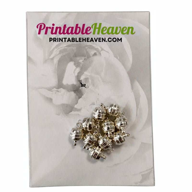 Ten silver barrel-shaped Printable Heaven Silver Magnetic Jewellery Clasps on a branded display card.