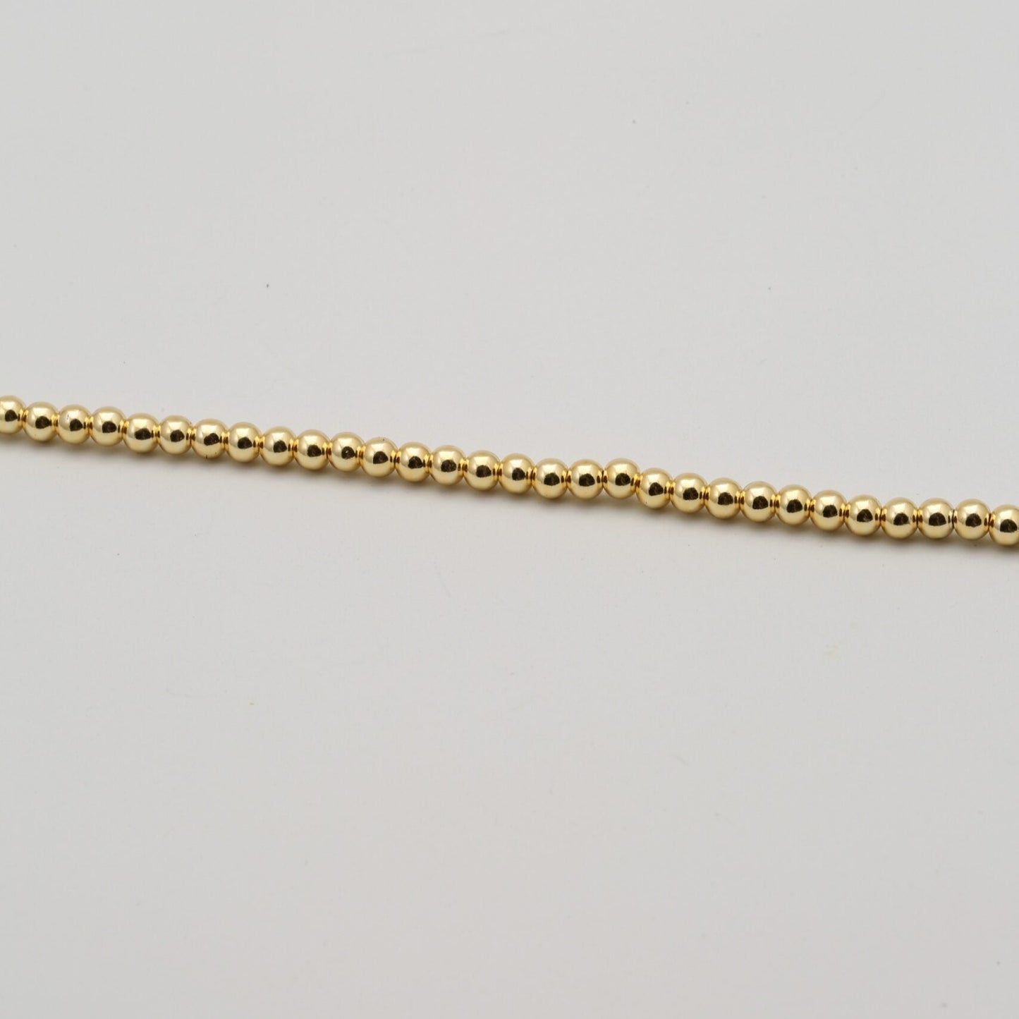 2.5mm Gold Mirror Pearls (100pcs)