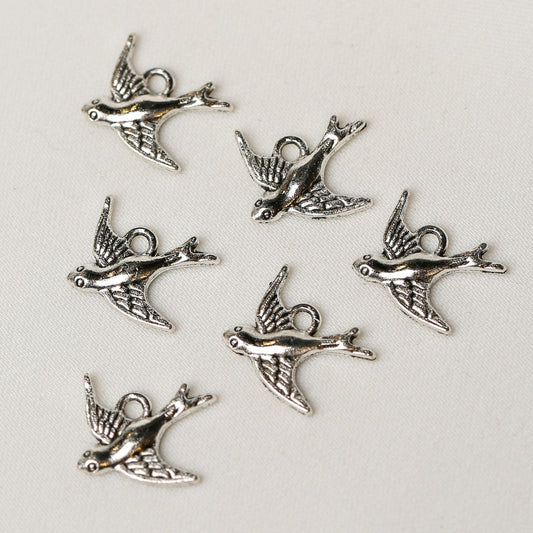 A cluster of six silver-colored metal Bird Metal Charms (6pcs) (MLB-077).