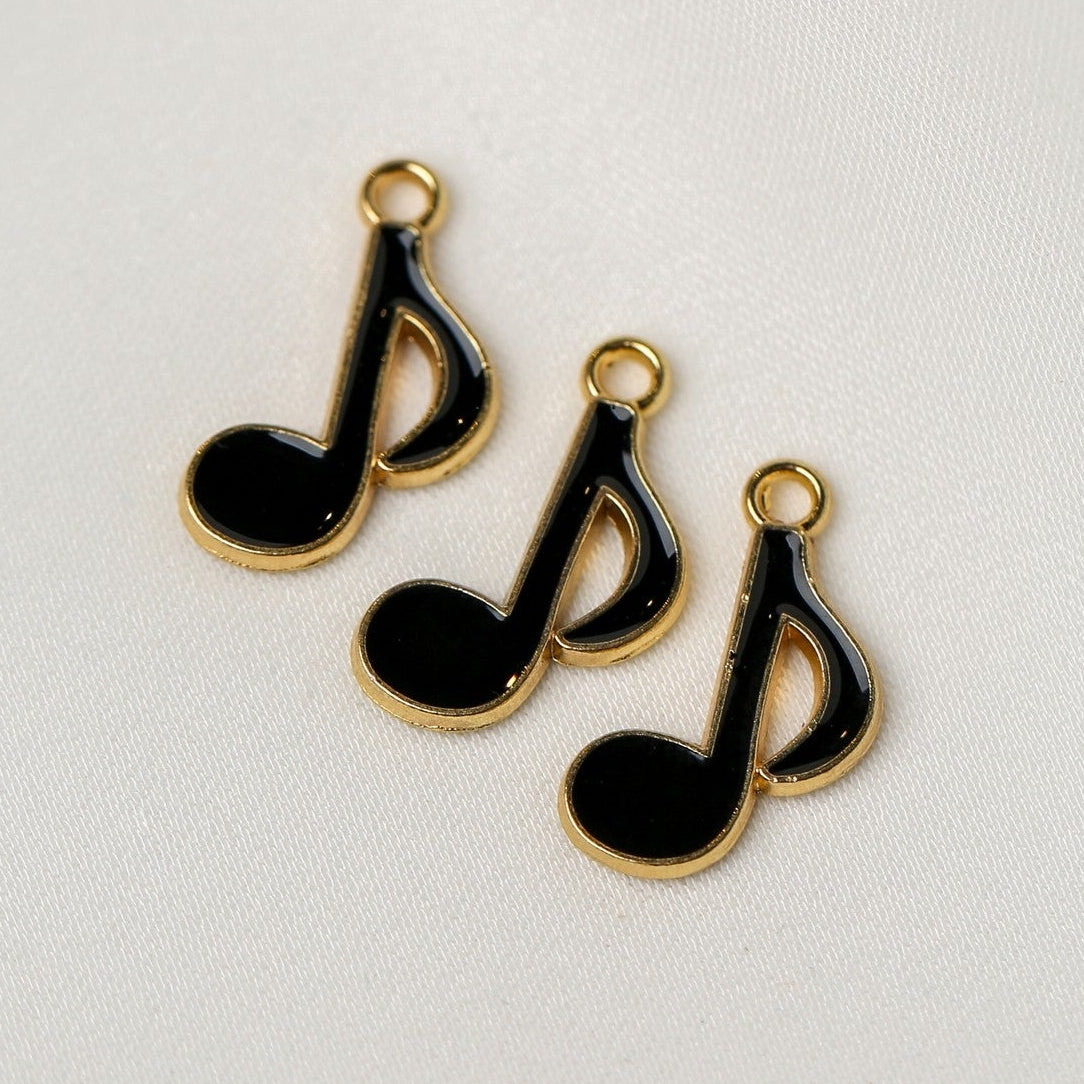 Three Quaver Music Note Metal Charms (3pcs) (MLB-101) with gold-toned finish and black enamel inlay.