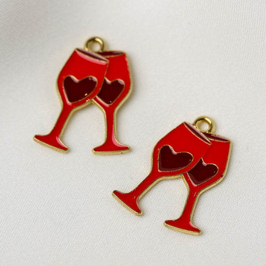 Valentine’s Wine Glass Metal Charms (2pcs) (MLB-113) shaped like two red wine glasses with heart-shaped cutouts.