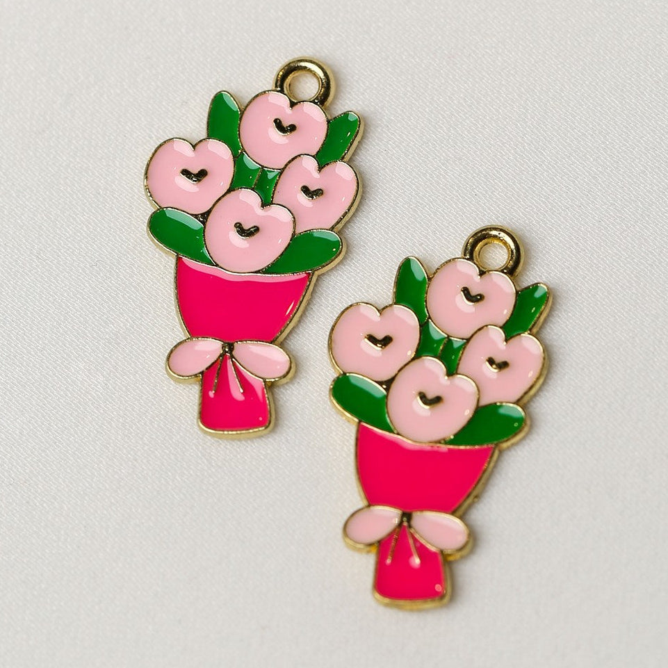 Rose Bouquet Metal Charms (2pcs) (MLB-115) shaped like rose bouquets with pink petals, green leaves, and pink wrapping.