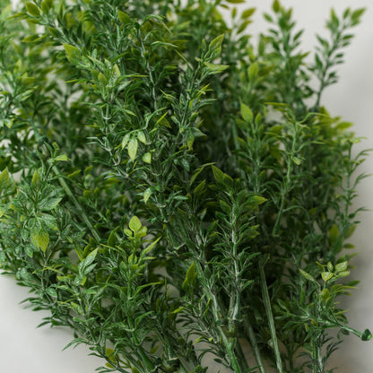 A cluster of Printable Heaven Faux Leaf Sprigs featuring green leaves on slender 18.5″ stems.