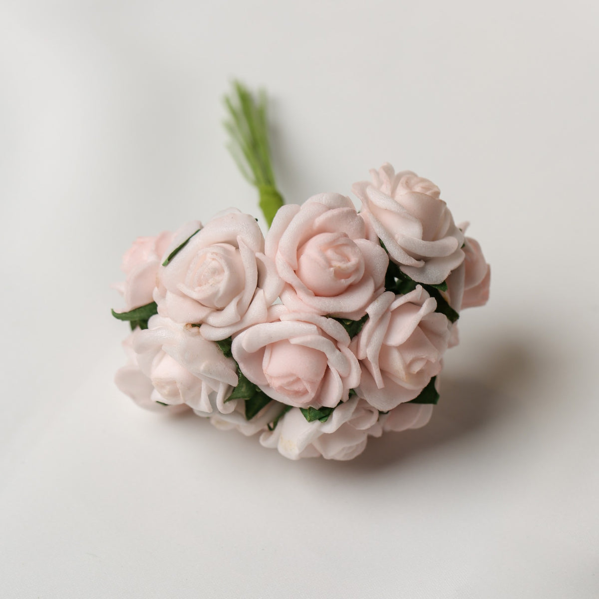 A small bunch of Printable Heaven Small Foam Rose Bunch in light pink, each measuring 1″ wide.