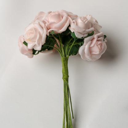 A bunch of Printable Heaven Small Foam Rose Bunch in Light Pink (1″ Wide) featuring small, light pink foam roses on green wired stems.