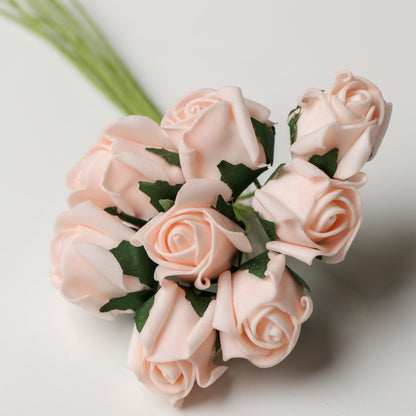 A bunch of Printable Heaven Medium Foam Rose Bunch in Light Pink, featuring small light pink foam roses with green stems and leaves.