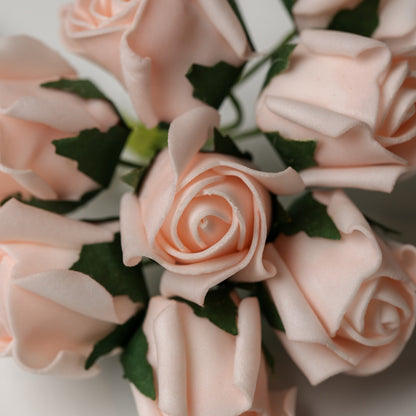 A cluster of Printable Heaven Medium Foam Rose Bunch in Light Pink, featuring light pink foam roses with small green leaves.
