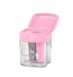 The Faber Castell Mini Box Sharpener in pastel pink by Printable Heaven features a transparent container and an open pink lid, revealing the sharpener blade inside. Its clear design lets you easily view the blade and shavings compartment, combining style with practical function.