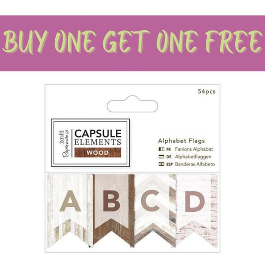 A promo image displays a 2 FOR 1 OFFER on Fast Bundle’s Papermania Alphabet Flags (54pcs, Elements Wood, PMA 174672), with four neutral flag tags labeled A, B, C, and D—ideal for crafting projects.