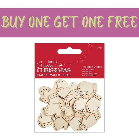 A 2 FOR 1 OFFER on Fast Bundle's Create Christmas Wooden Shapes (30pcs) – Mini Mittens Natural (PMA 174588) is shown below a bold, yellow-green "BUY ONE GET ONE FREE" banner on a purple background.